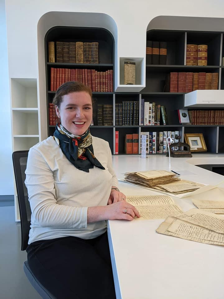 Caroline Hackett working in a French archive